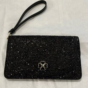 Kate Spade small multifunctional wristlet black glitter. Used